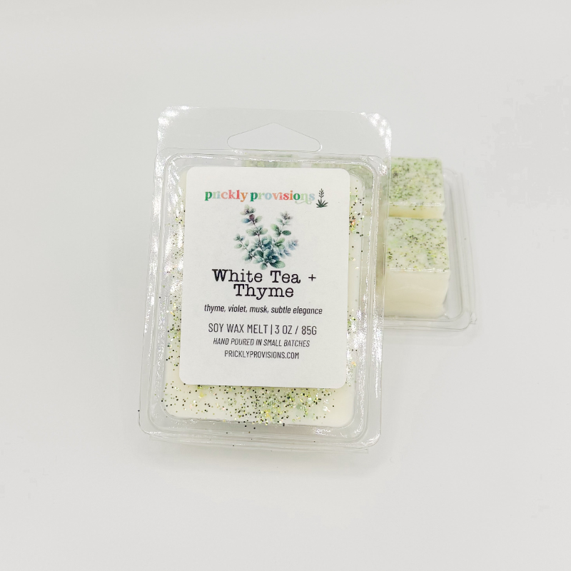 White Tea + Thyme wax melts in a clear 2.5 oz six-cavity clamshell