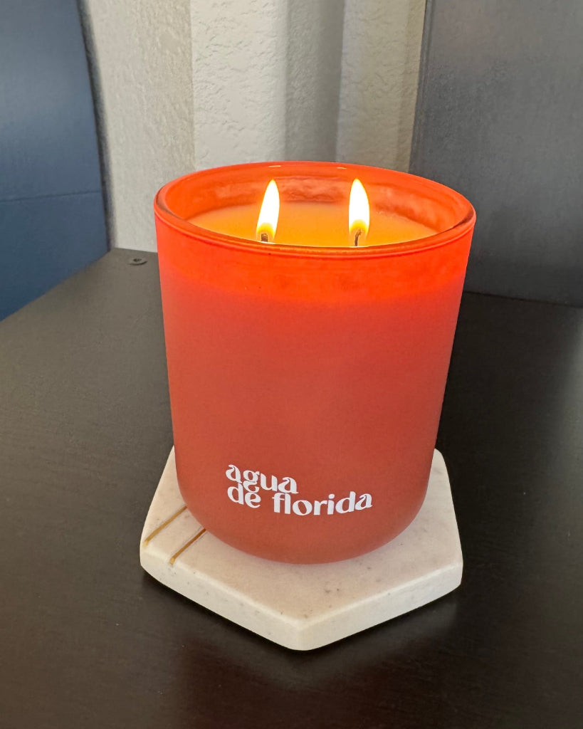 Agua de Florida 9 oz double-wick candle in a matte clay glass vessel.