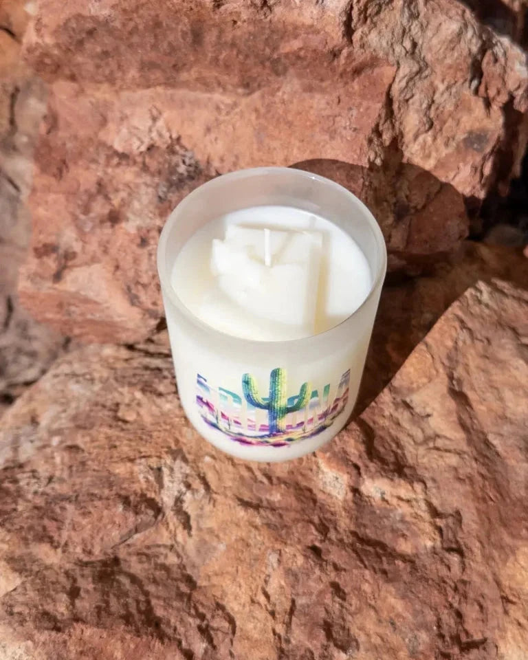Arizona Sunset coconut soy candle in a printed frosted glass vessel with an Arizona desert design.
