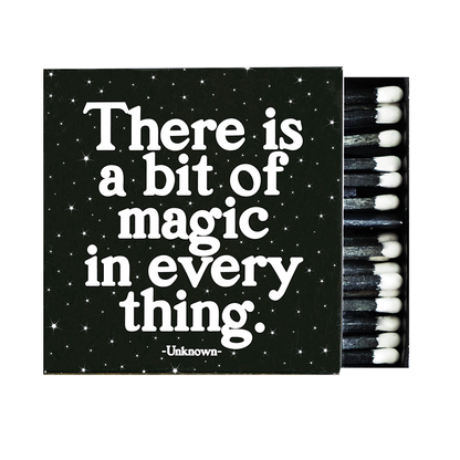 Matchbox with motivational quote 'There is a bit of magic in everything' by Unknown on a black background.
