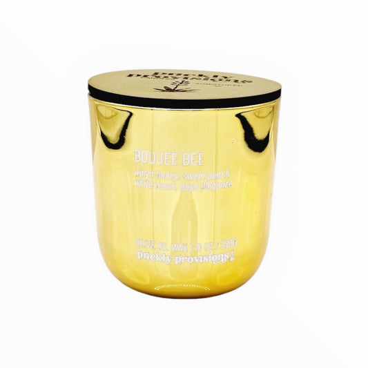 Gold mirror container with gold lid on a white background