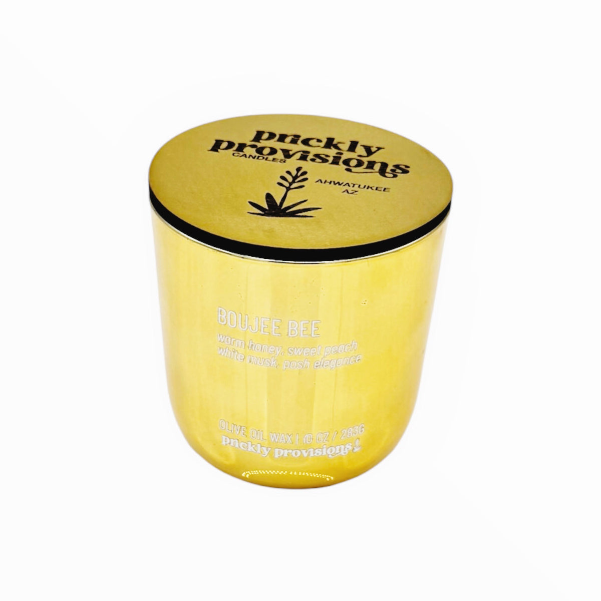 Gold mirror candle with a gold lid featuring 'Prickly Provisions' branding on a white background.