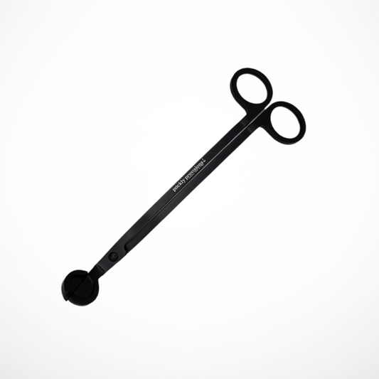 Black candle wick trimmer on a white background