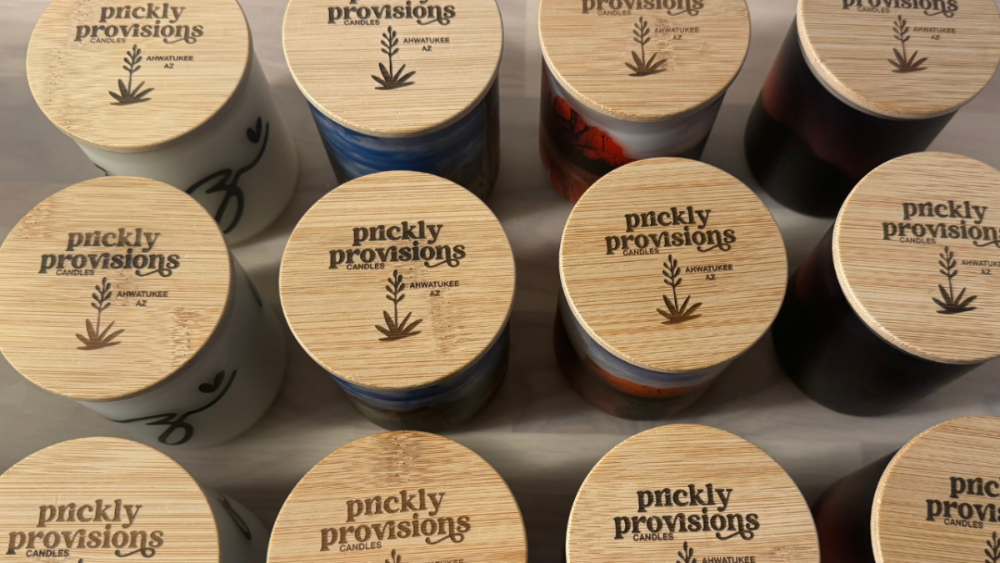 Several Candles with Custom Branded Wooden Lids