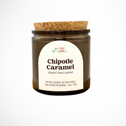 Candle jar with cork lid labeled 'Chipotle Caramel' on a white background