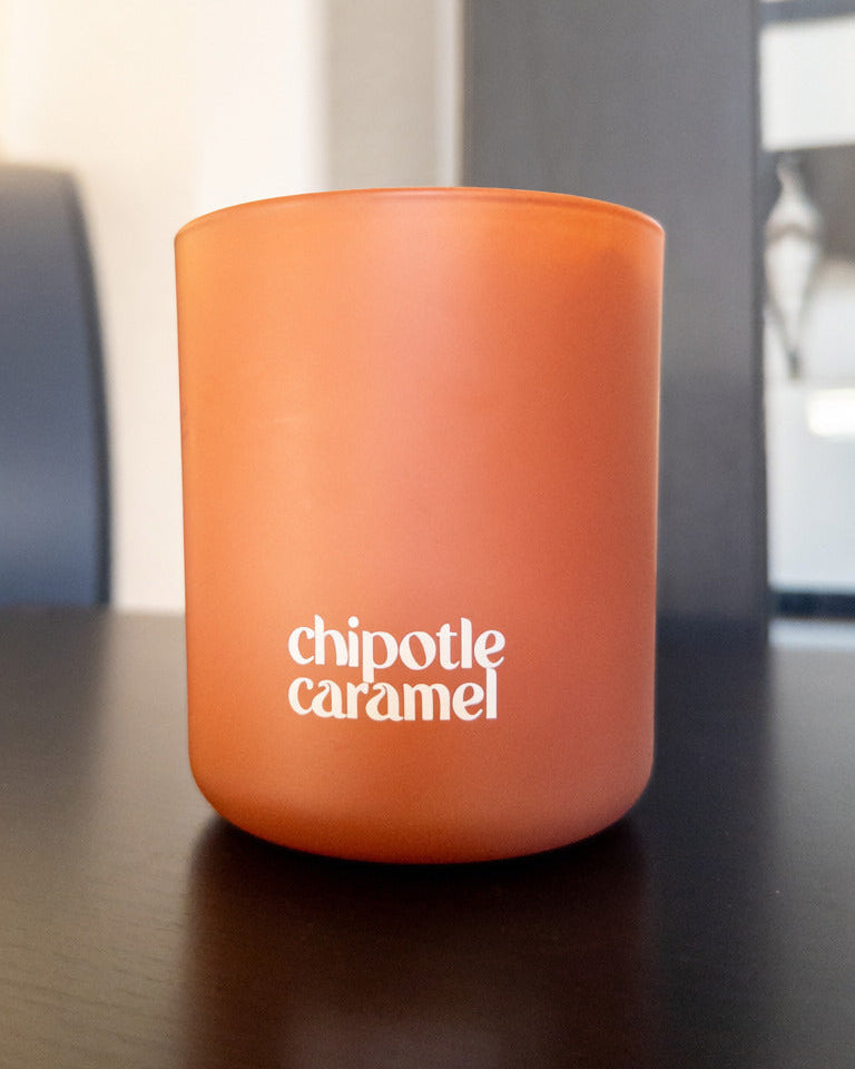 Chipotle Caramel candle in a modern matte clay glass vessel
