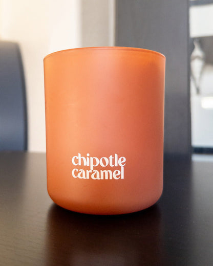 Chipotle Caramel candle in a modern matte clay glass vessel
