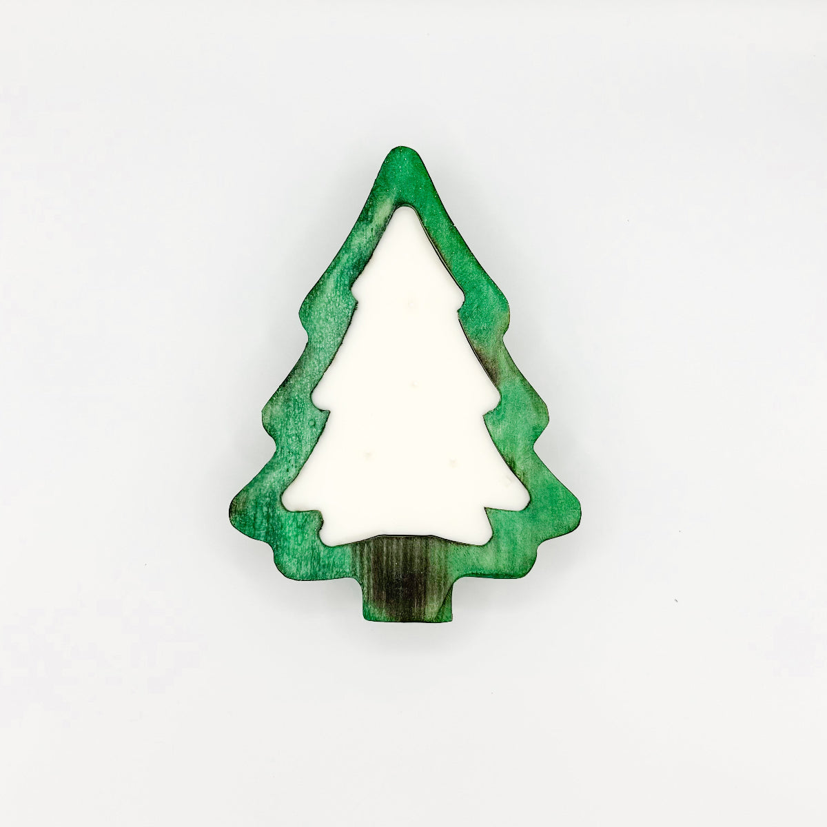 A Christmas tree shaped green stained wooden dough bowl candle with 4 wicks