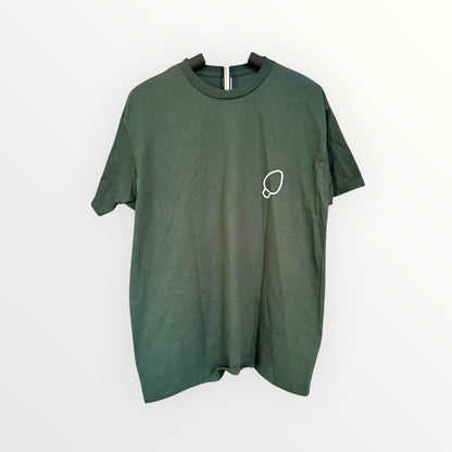 Green t-shirt with a small white logo on a light gray background