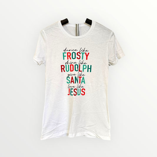 White t-shirt with colorful Christmas-themed text on a white background