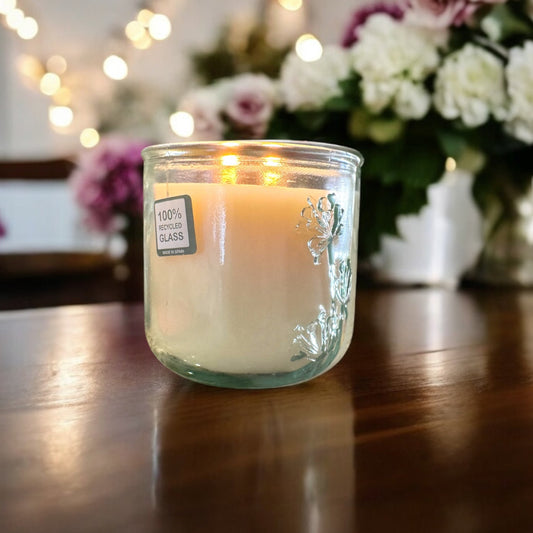 A hand poured candle with a flower shoppe fragrance poured in a 100% recycled glass jar Flower Shoppe Candle - Floral, Green, Earthy, and Sweet Scent