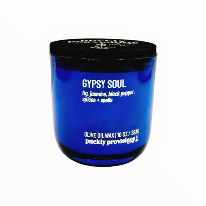 Blue container with black lid labeled 'Gypsy Soul' on a white background