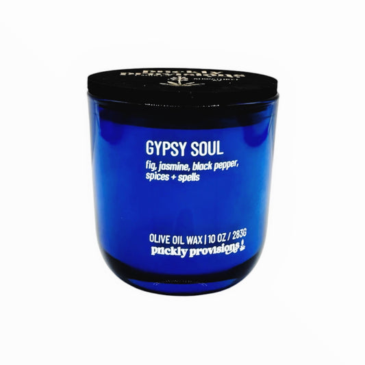 Blue container with black lid labeled 'Gypsy Soul' on a white background