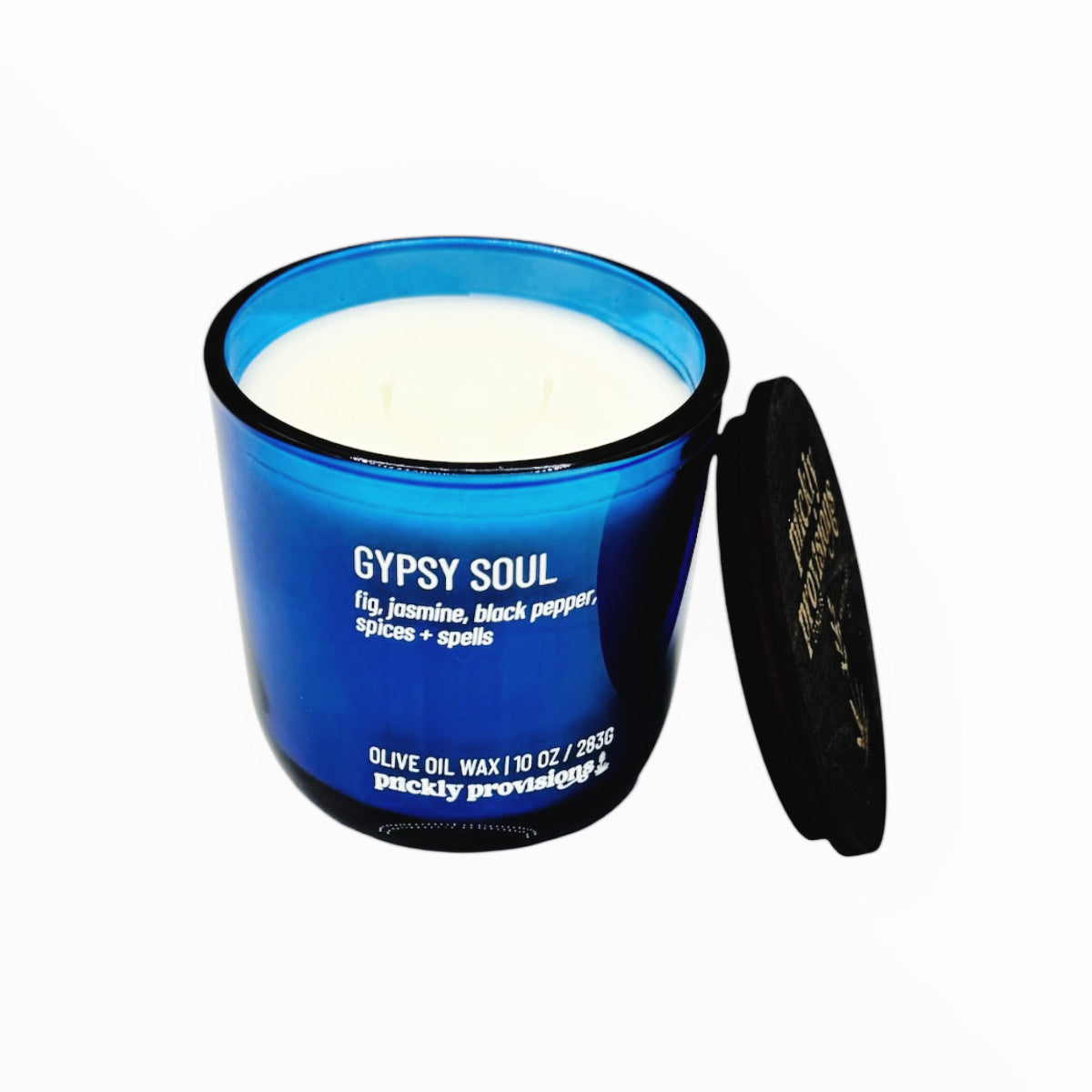 Blue candle jar labeled 'Gypsy Soul' with a black lid on a white background
