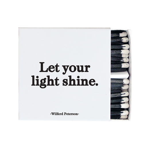 Matches with 'Let your light shine' quote by Wilfred Peterson on a white background