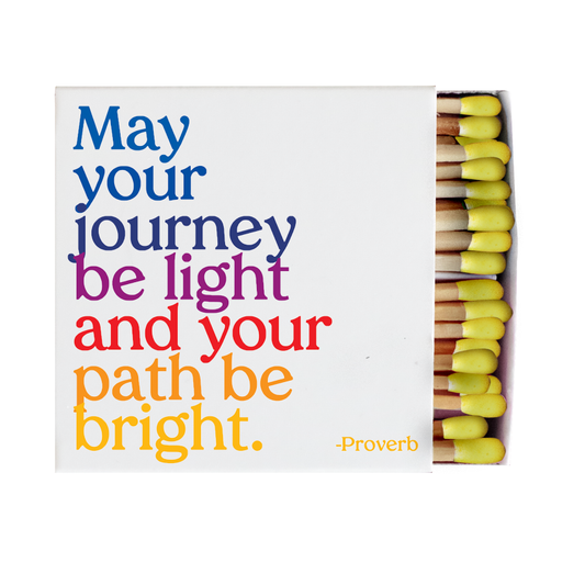 Matches with colorful matchsticks and motivational quote on a white background