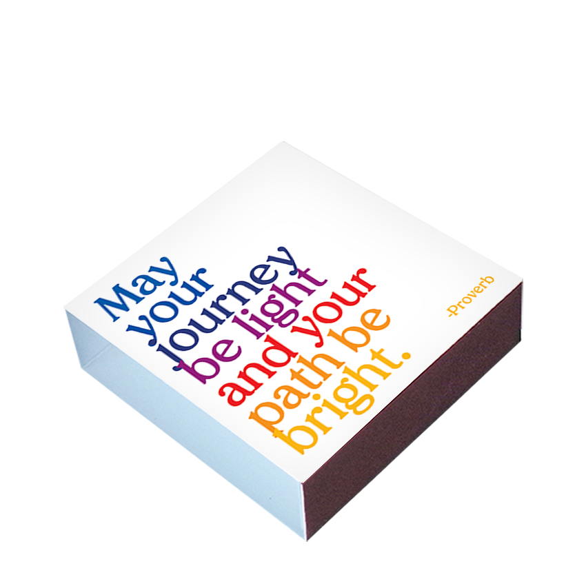 Matchbox with motivational quote on a white background
