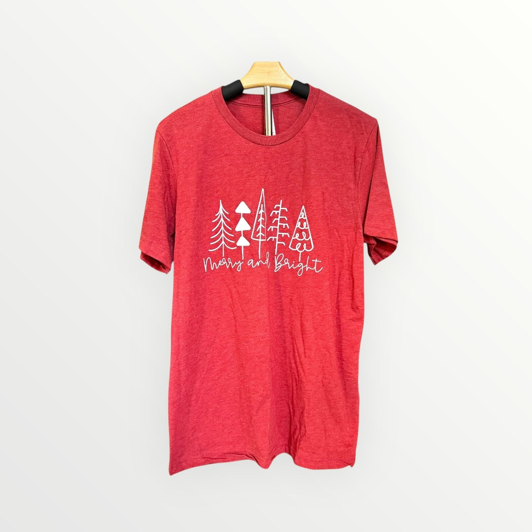 Red t-shirt with white tree design and text on a hanger against a white background