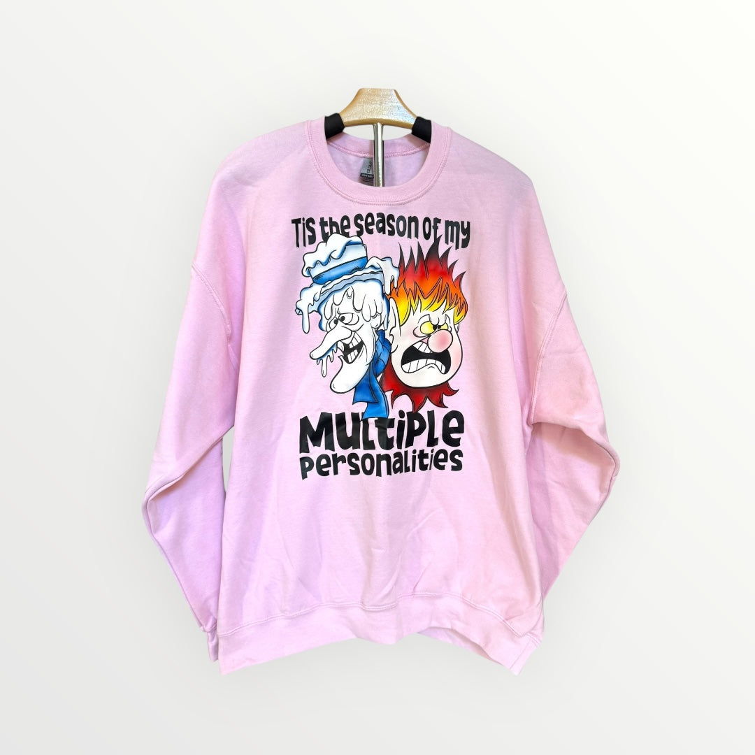 Pink sweatshirt with graphic design and text on a white background