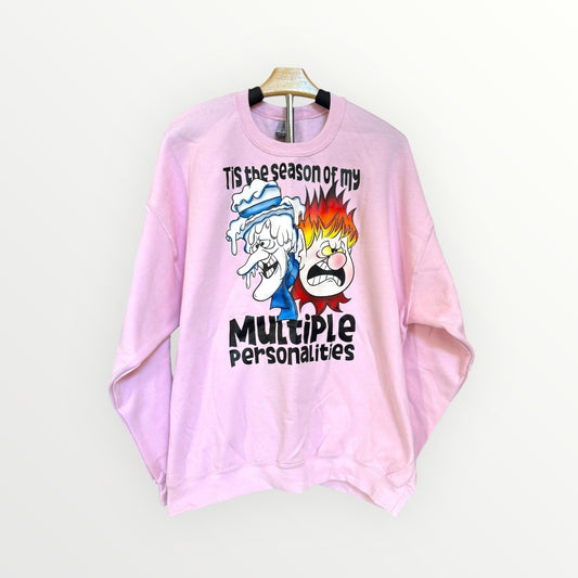 Pink sweatshirt with graphic design and text on a white background