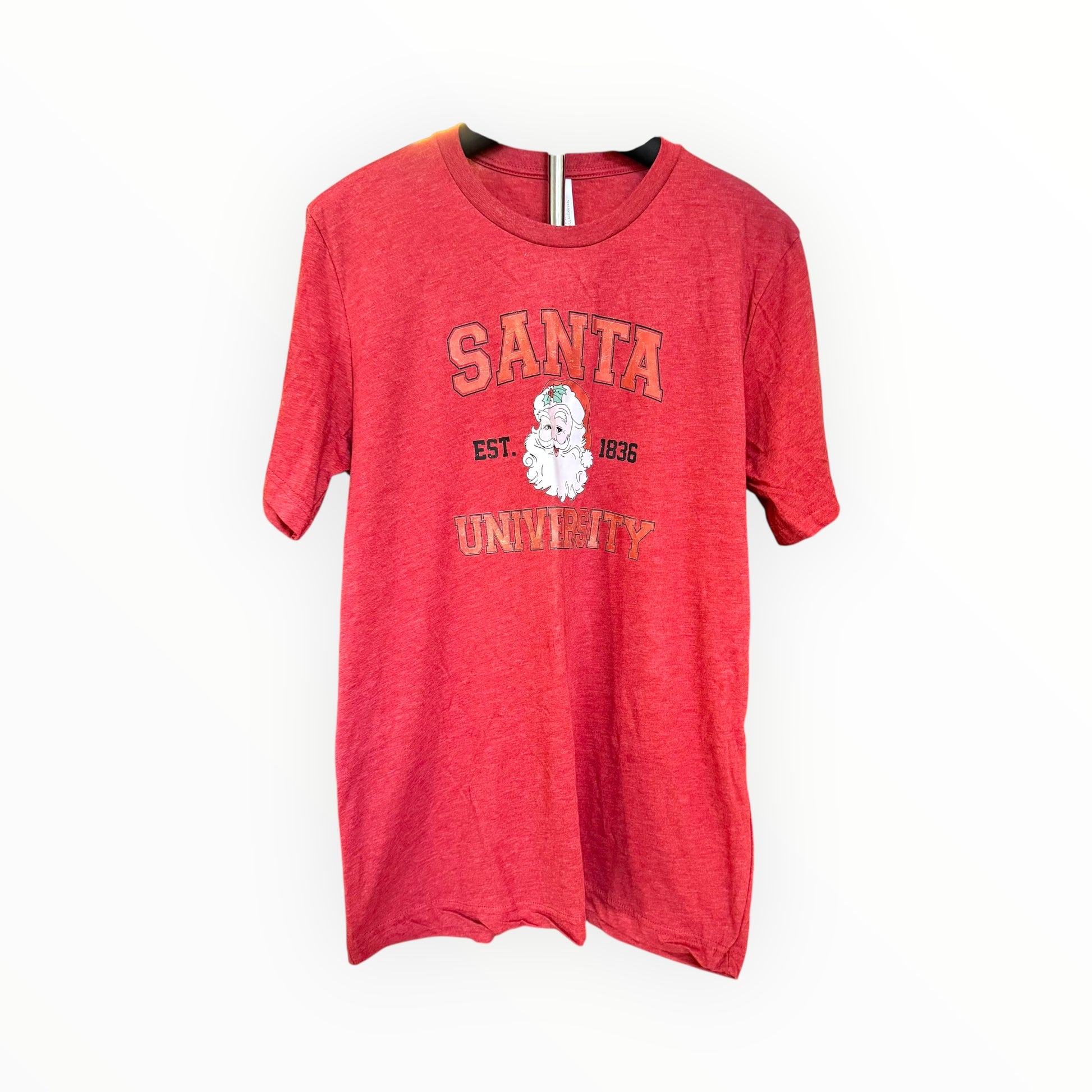 Red t-shirt with 'Santa University' print on a white background