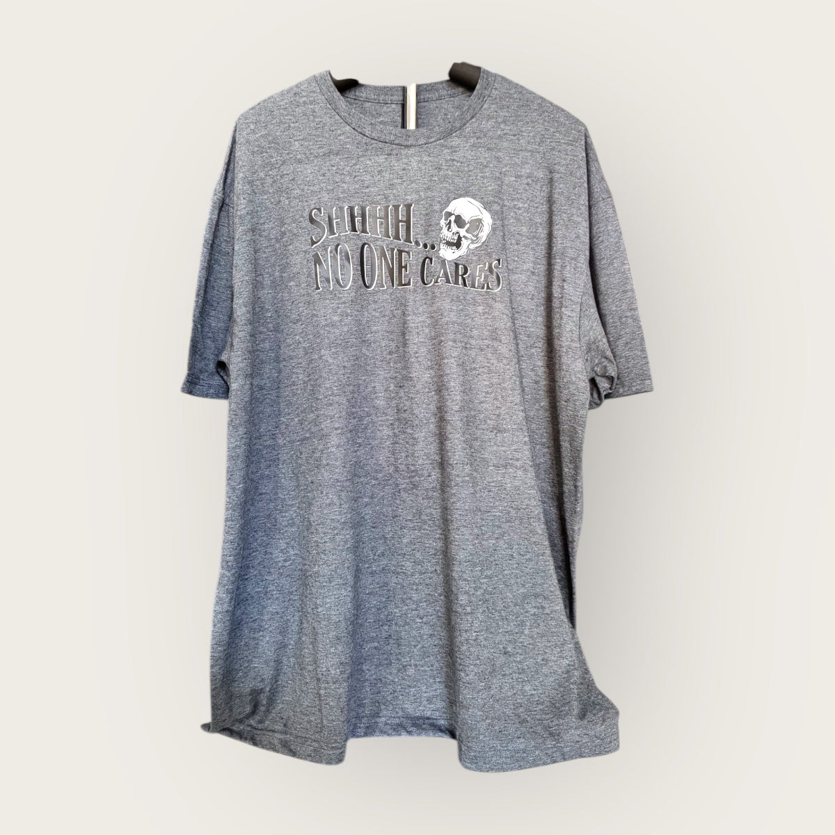 Shhhh... No One Cares t-shirt in color heather charcoal