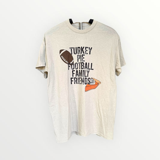 Beige t-shirt with 'Turkey Pie Football Family Friends' text and graphics on a white background