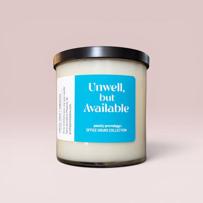 Unwell, But Available 10 oz double-wick office candle with a bright blue label and black metal lid.