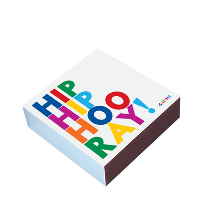 White Hip Hip Hooray matchbox with bold multicolored lettering
