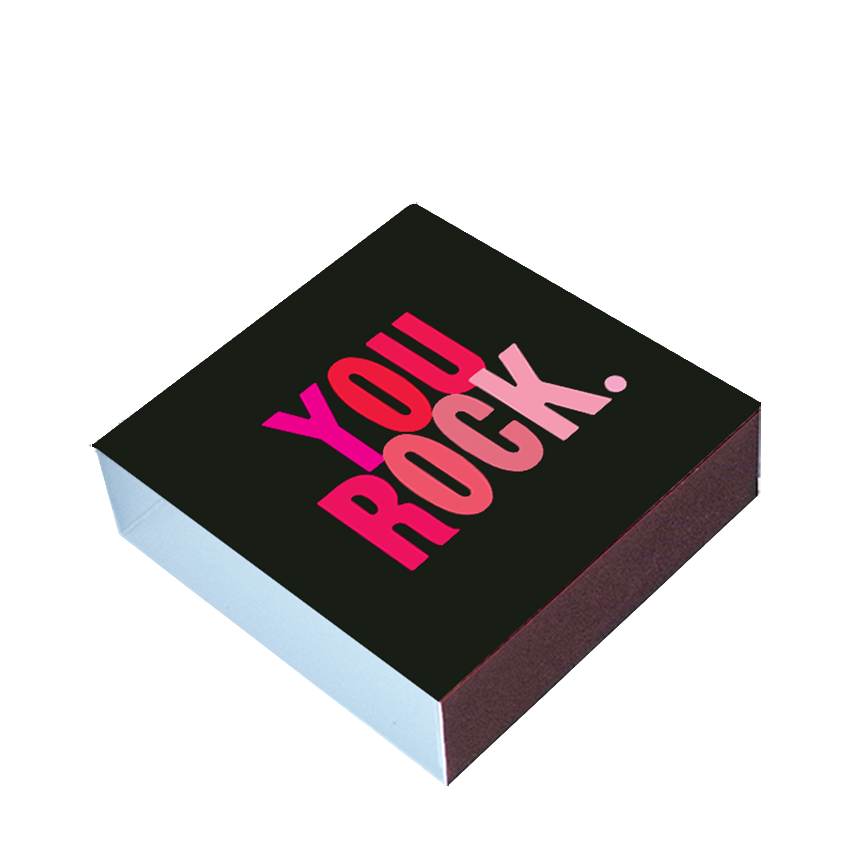 Black box with 'YOU ROCK' text in pink on a white background