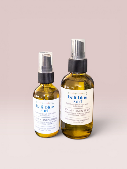 Bali Blue Surf room and linen spray in 2 oz and 4 oz transparent green bottles