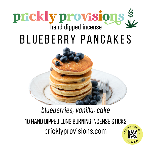 Promotional image for 'Blueberry Pancakes' incense from Prickly Provisions with a stack of pancakes and blueberries on a plate.