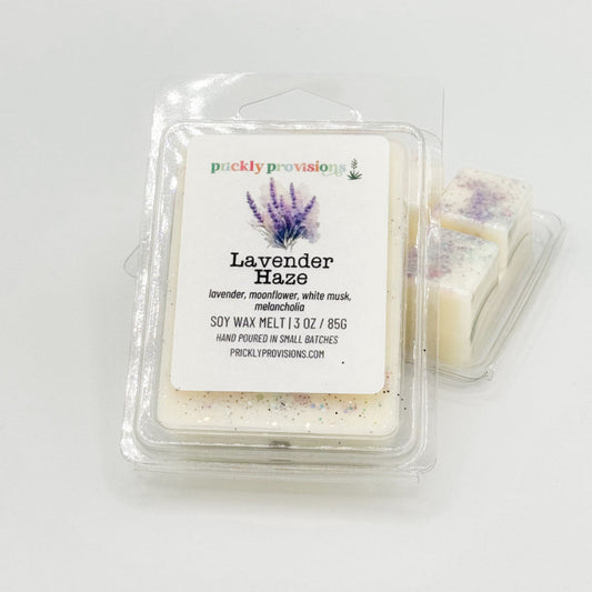Lavender Haze wax melts in a clear 2.5 oz six-cavity clamshell