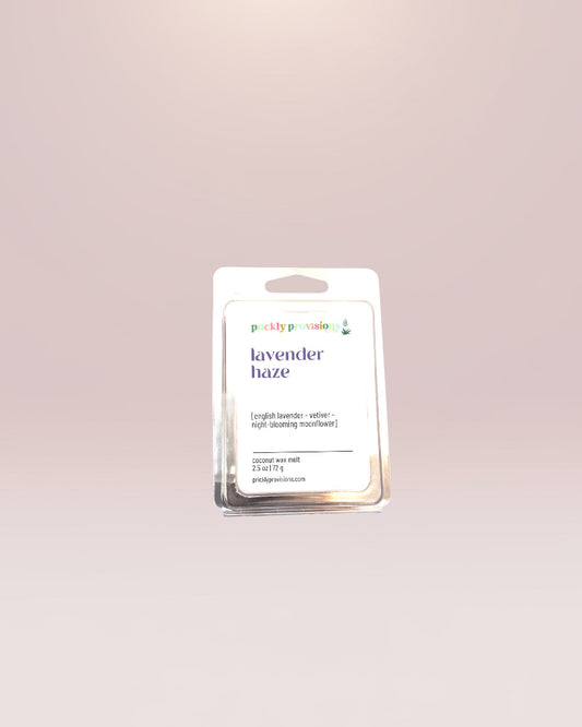 Lavender Haze scented wax melts with English lavender, jasmine, night-blooming moonflower, white musk, and sweet woods.