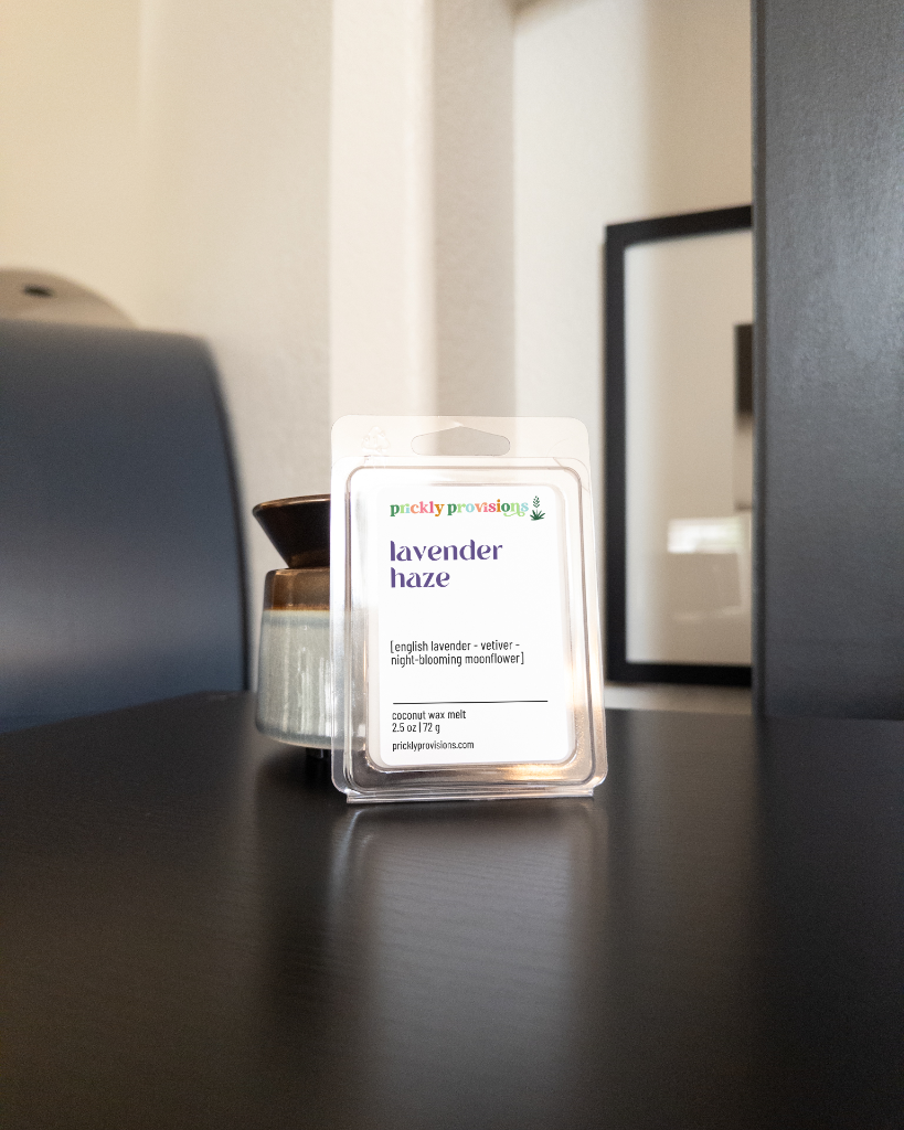 Lavender Haze wax melts displayed beside an electric wax warmer
