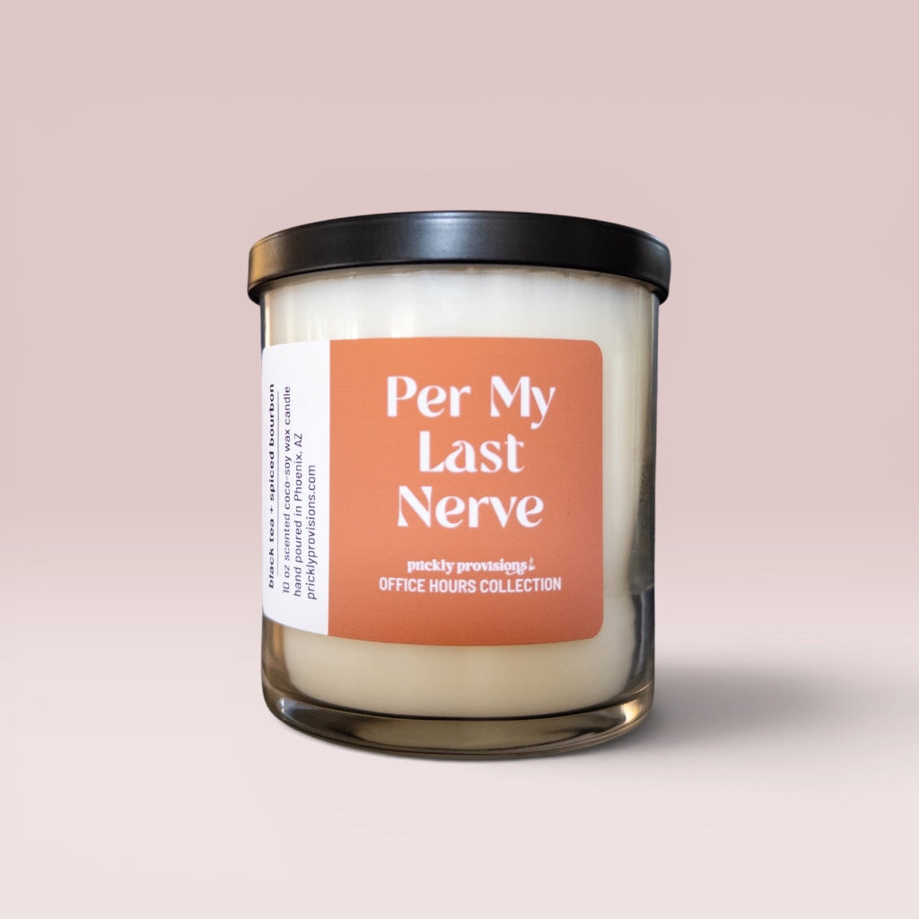 Per My Last Nerve 10 oz double-wick office candle with peach label and black metal lid.