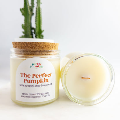 Candle labeled 'The Perfect Pumpkin' with a cactus in the background