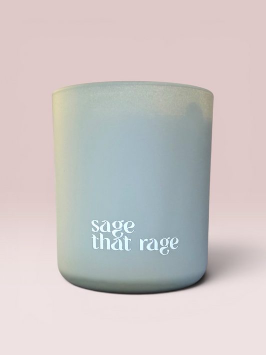 Sage That Rage 9 oz double-wick candle in a matte sage-green glass vessel.