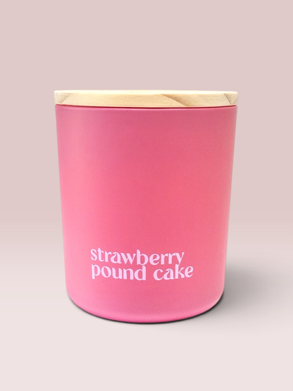 Strawberry Pound Cake 9 oz double-wick candle in a matte pink glass vessel.
