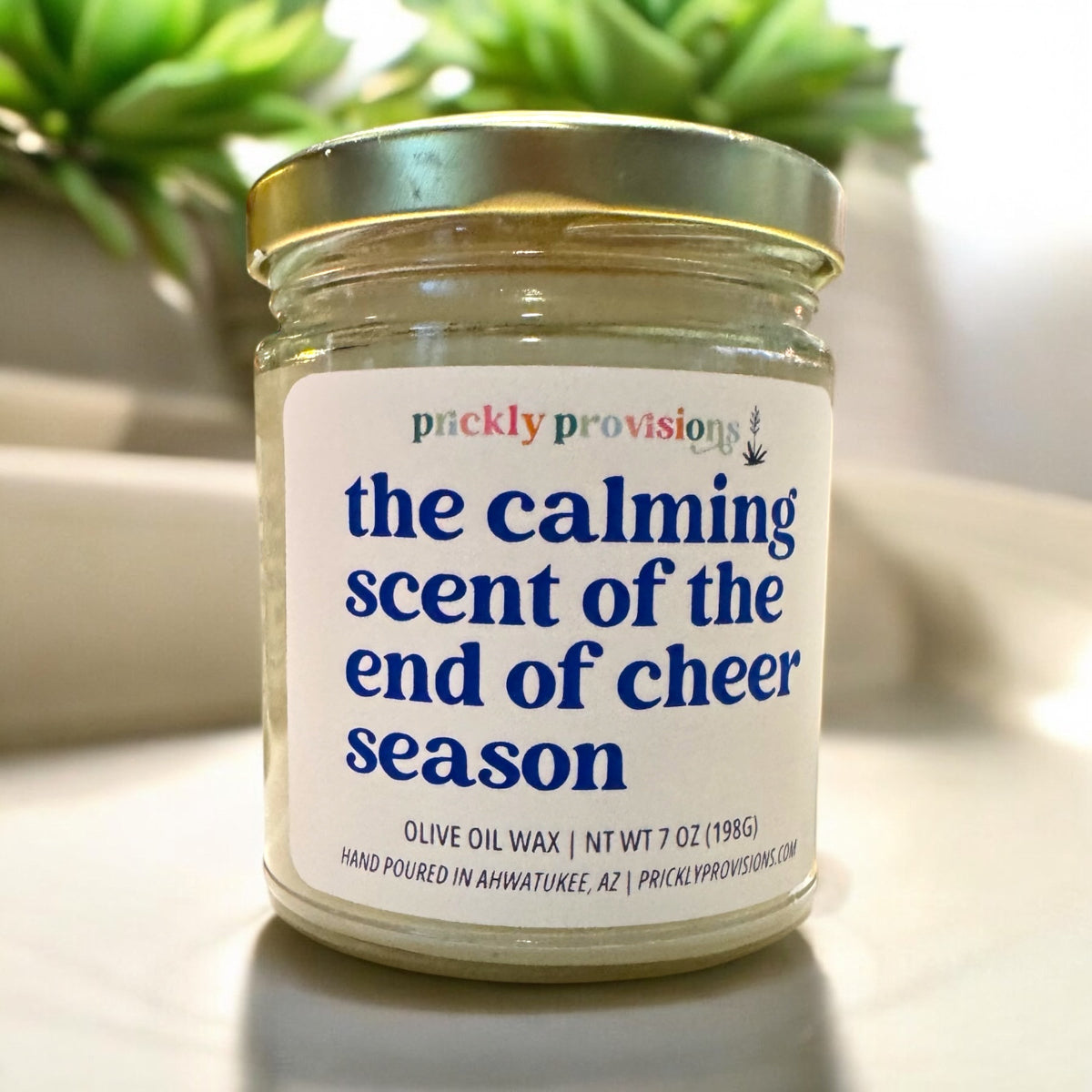 the calming scent of the end of cheer season olive oil wax candle