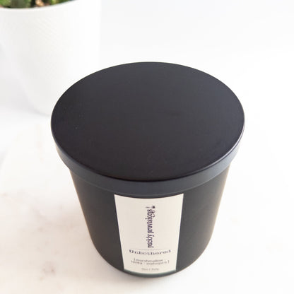 Black container with a label on a white background